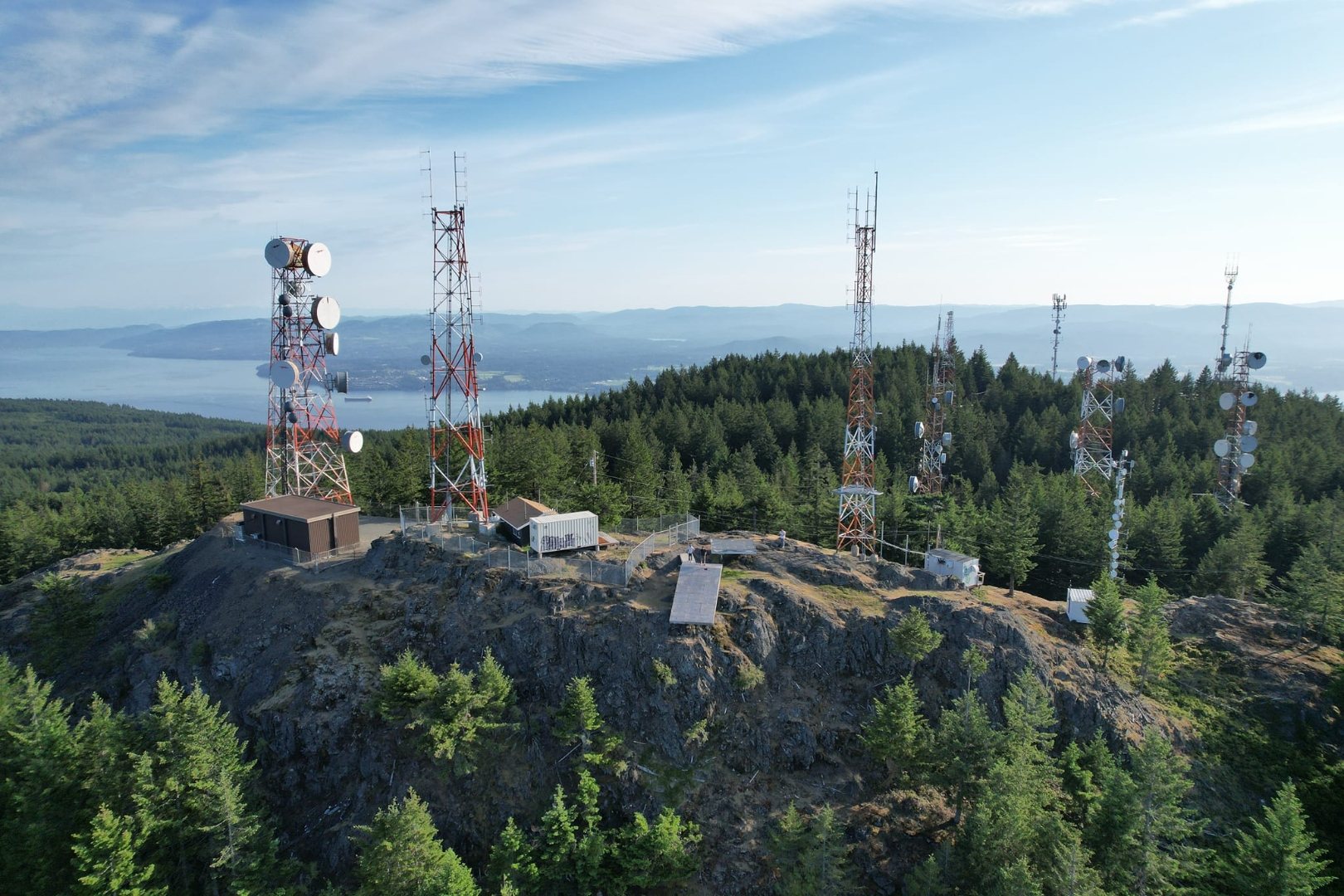 Mountain summit with multiple telecom towers