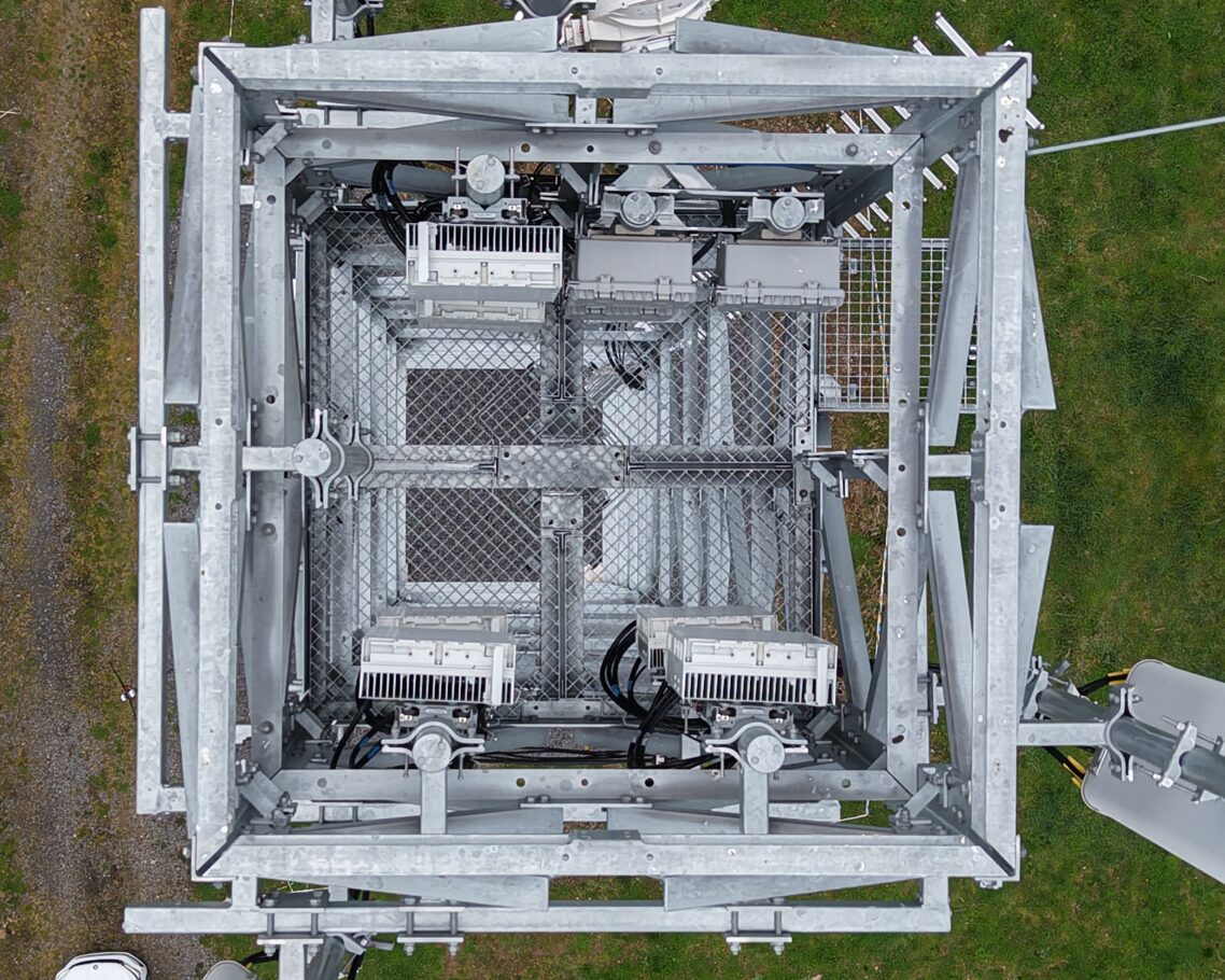 Top-down view of a lattice tower platform during inspection